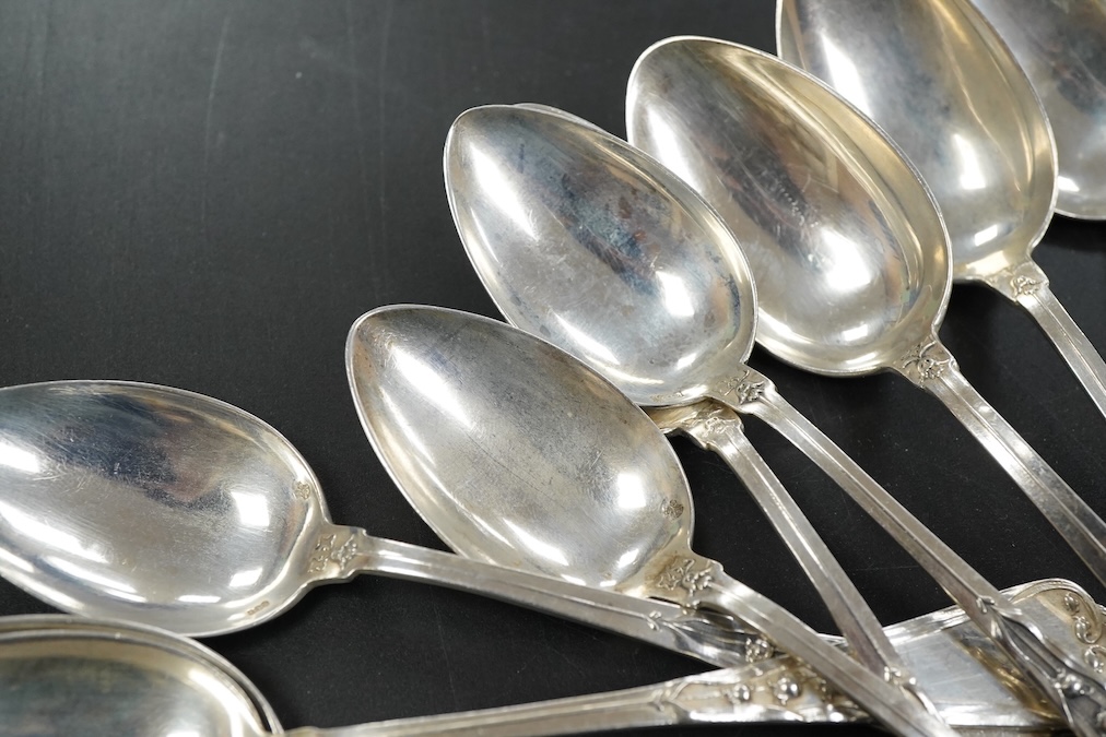 A set of eleven continental Art Nouveau .800 silver teaspoons length 14.8 cm., weight approx. 6.98ozt